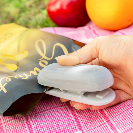 Zavírač sáčků s řezačkou a závěsem Baseyl InnovaGoods
