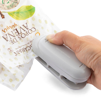 Zavírač sáčků s řezačkou a závěsem Baseyl InnovaGoods