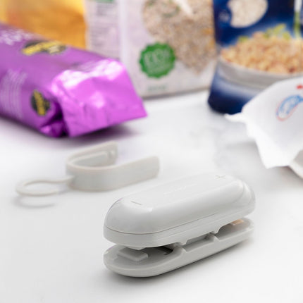 Zavírač sáčků s řezačkou a závěsem Baseyl InnovaGoods