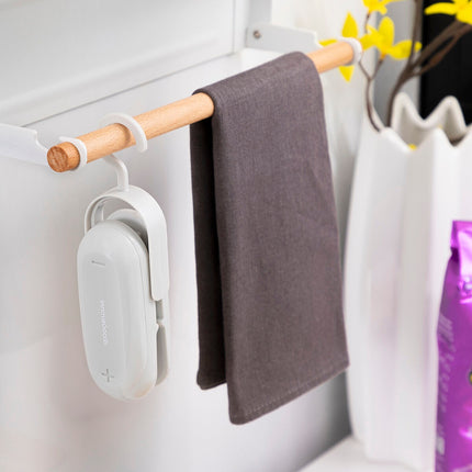 Zavírač sáčků s řezačkou a závěsem Baseyl InnovaGoods