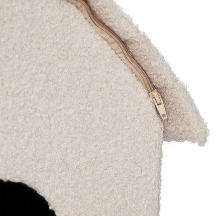 Beige cat pit with scratching surface