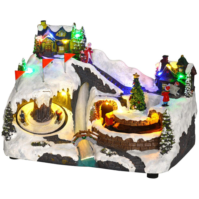 Christmas village with LED lights, music and moving train