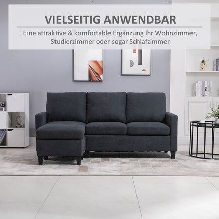 Dark gray reversible L-shaped fabric sofa with chaise longue