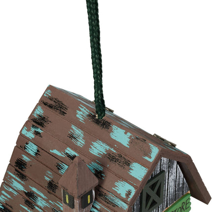Dekorativní ptačí budka v designu obchůdku