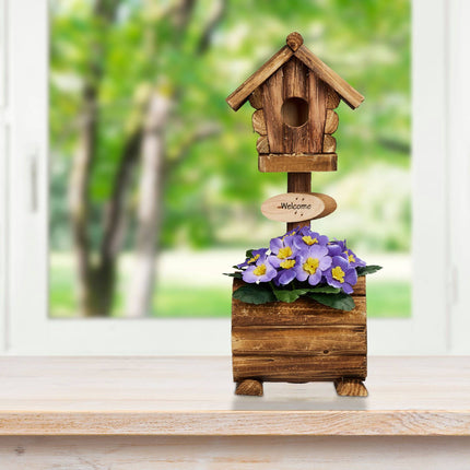Decorative bird house with flower pot