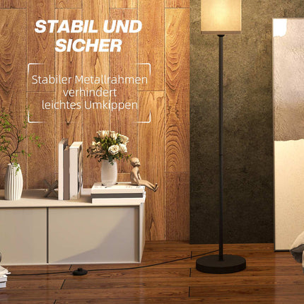 Moderní černá stojací lampa se stínidlem ve vzhledu lnu, nožní vypínač