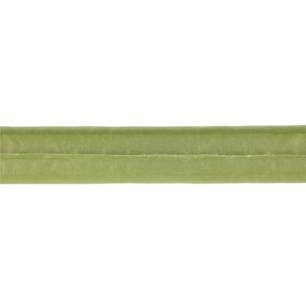Zelený samonafukovací kempingový polštář, kompaktní a přenosný