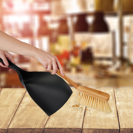 The mop consisting of a shovel and a broom