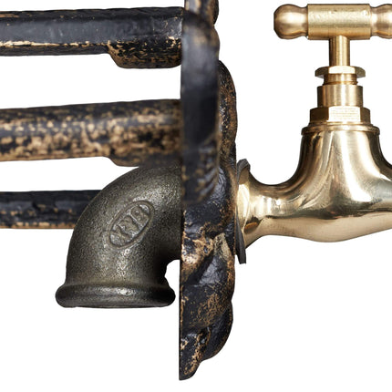 Vintage hose holder with faucet