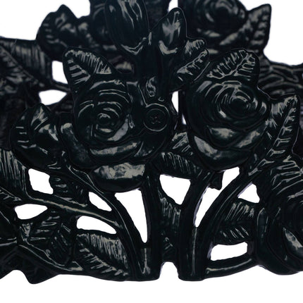 Vintage hose holder with rose motif