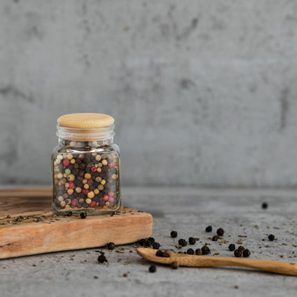 set of 12 spice jars with bamboo lids